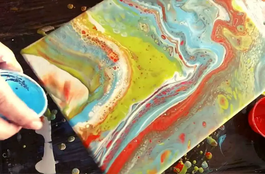 Emulsion paint pouring on canvas